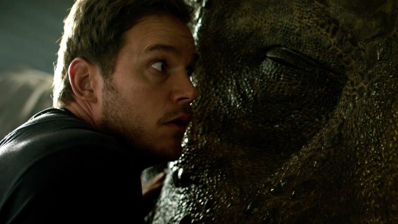 Chris Pratt rubs his face on a T.Rex.
